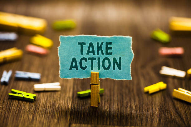 Piece of Paper saying "Take Action"